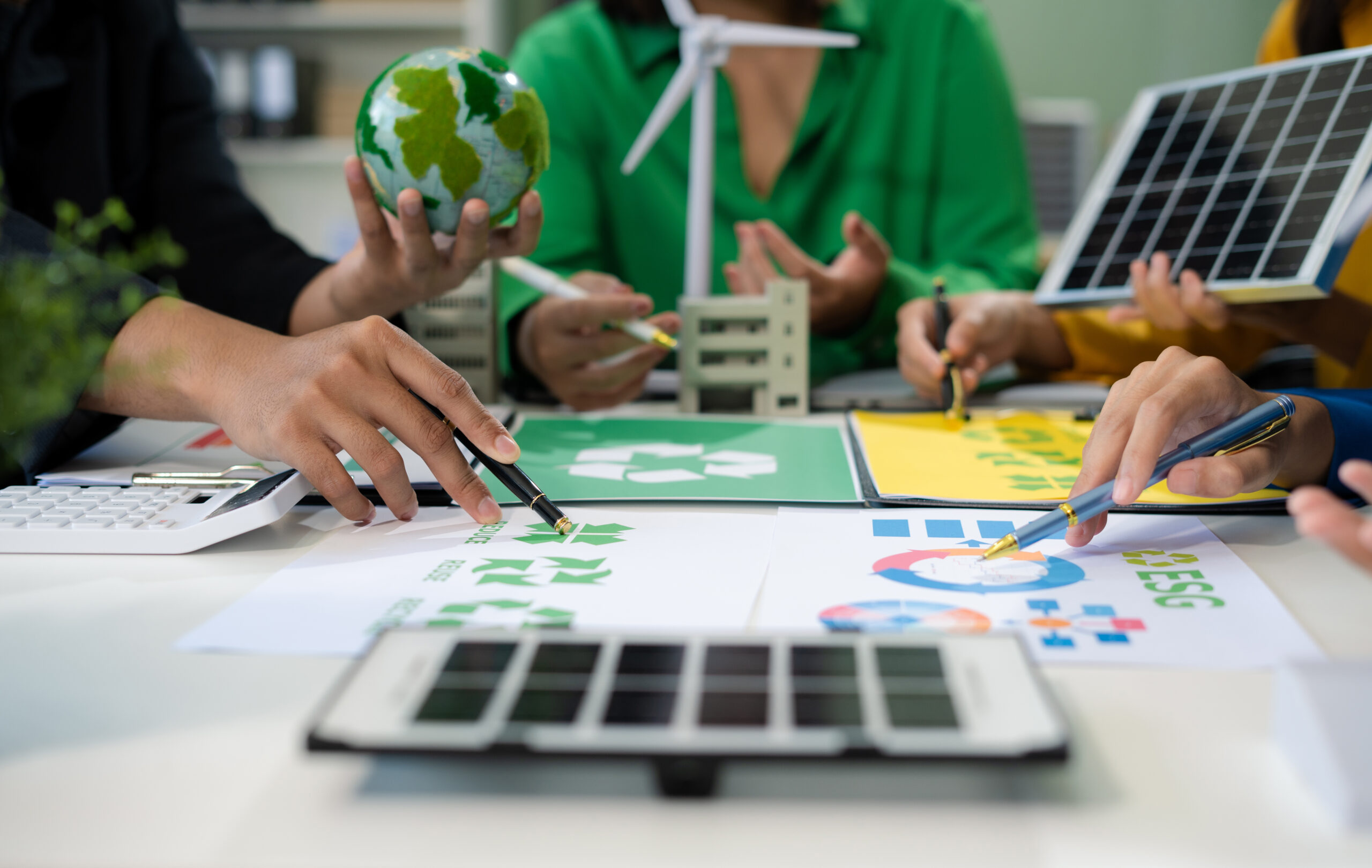 Businessman team using computer on CO2 emission reduction concep